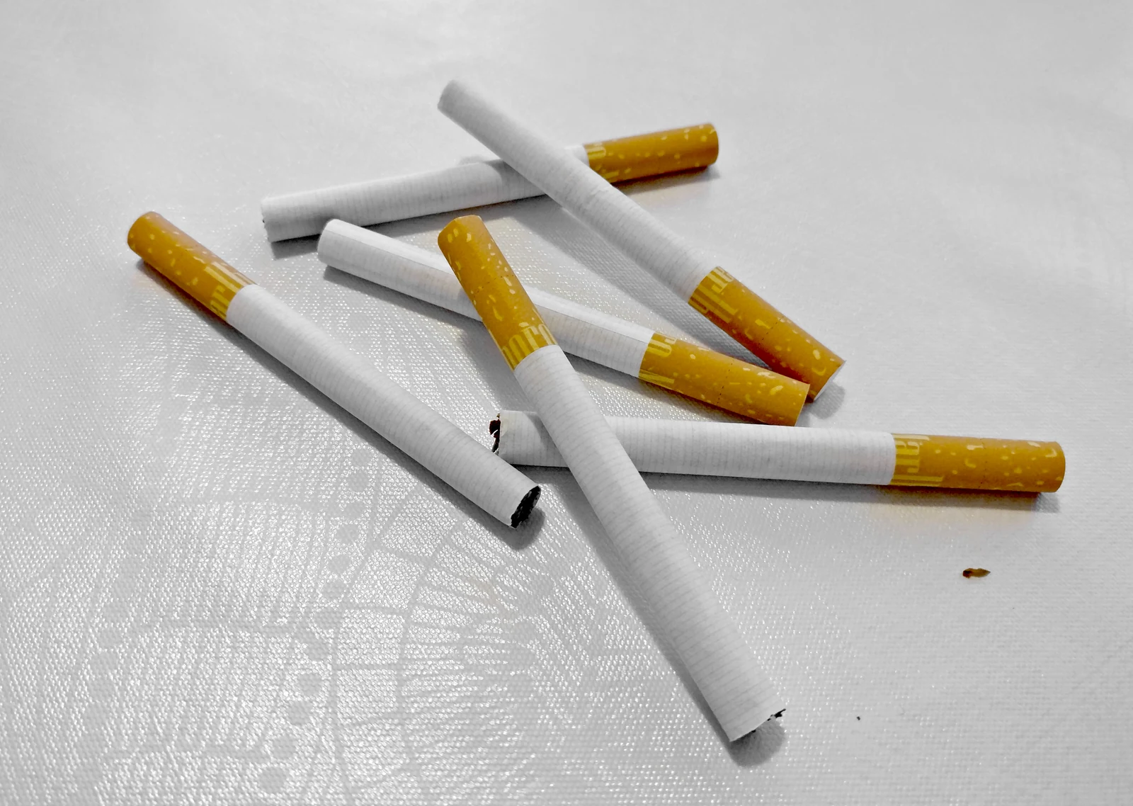 An archival close-up of unlit cigarettes