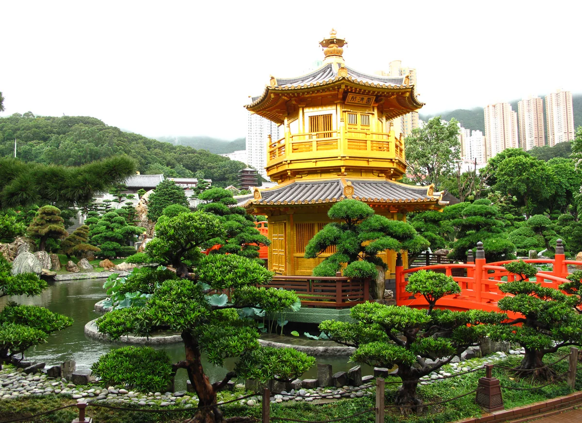 Golden pavilion, red bridge and water at Nan Lian Garden