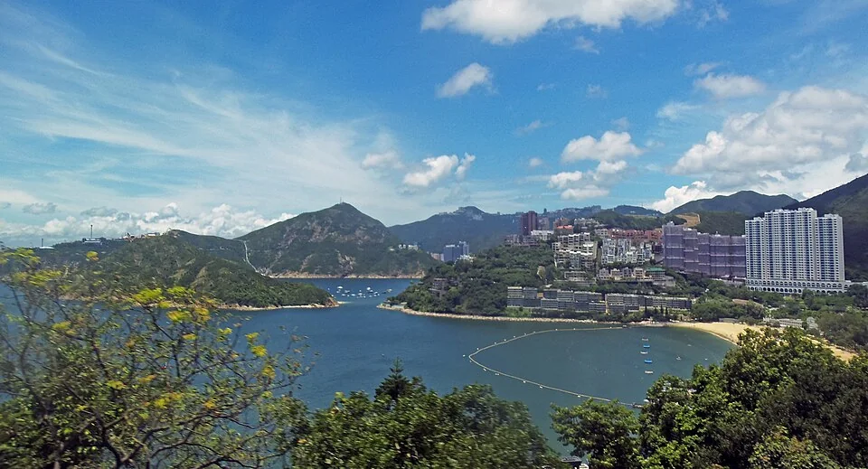 View across Repulse Bay towards its beach and surrounding hills from the east