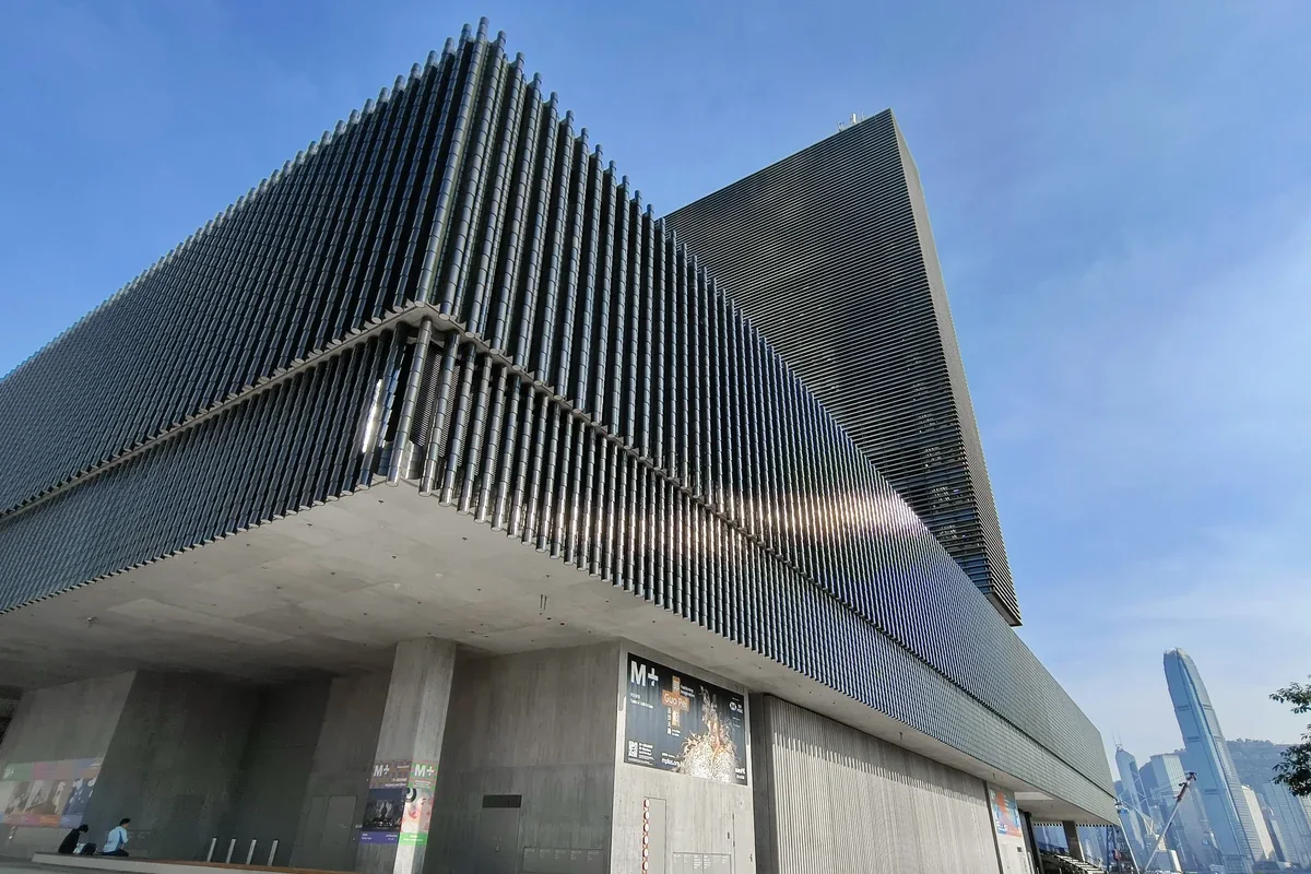 M+ façade and overhanging architectural spaces in West Kowloon